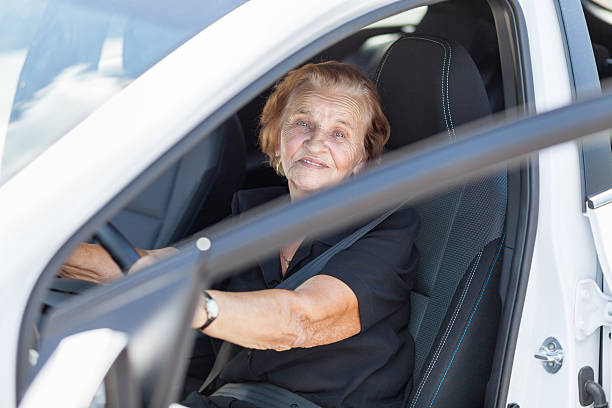 istock Elderly woman behind the steering wheel 615100456