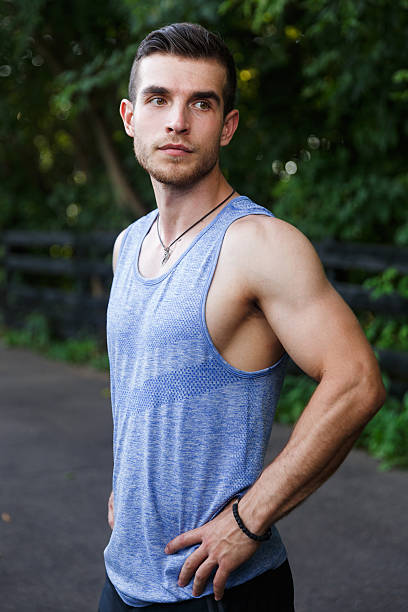 istock Young athlete standing on track in park 615100684