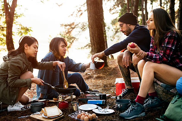 istock Friends Camping Eating Food Concept 615103018