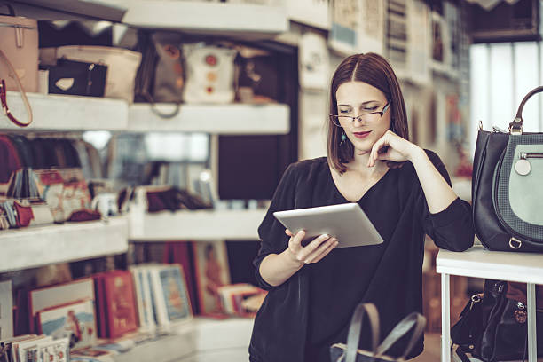 Young businesswoman is working in her store
