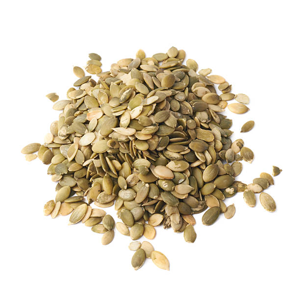 istock Pile of pumpkin seeds isolated 615107536