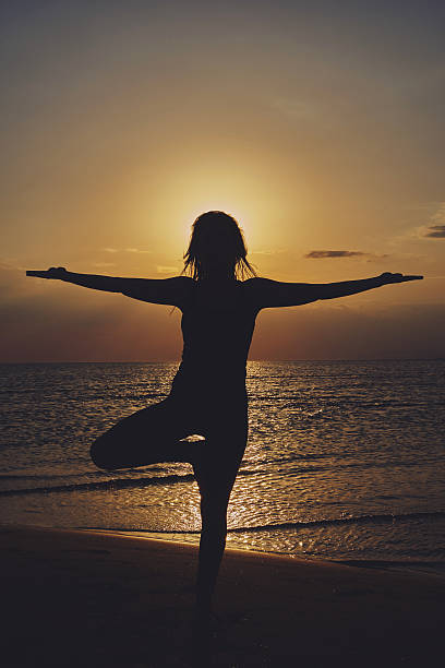 istock Woman practicing yoga in various poses (asana) 615108516
