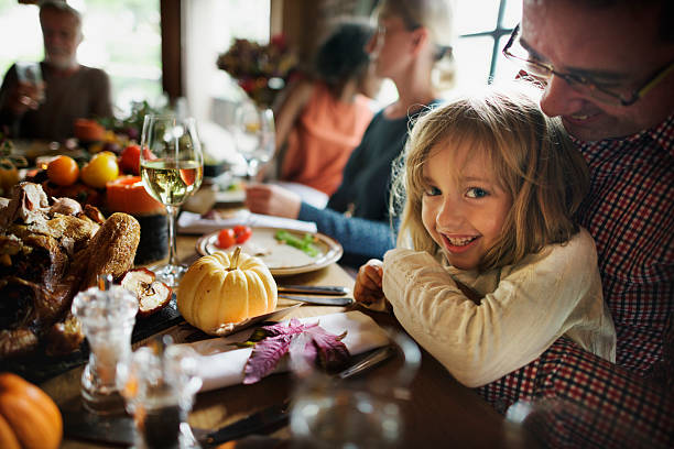 istock Little Girl Hugging Father Thanksgiving Celebration Concept 615111972