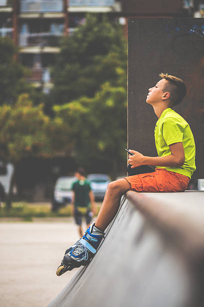 istock boy at the skate park 615113380