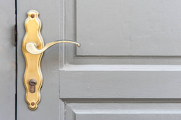 istock Knob on the painted door. 615116650
