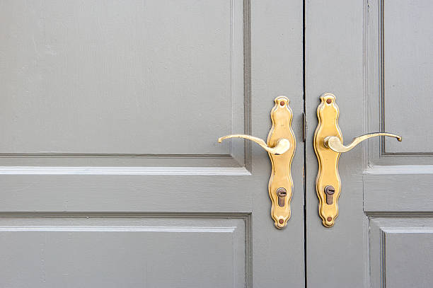 istock Knob on the painted door. 615117622