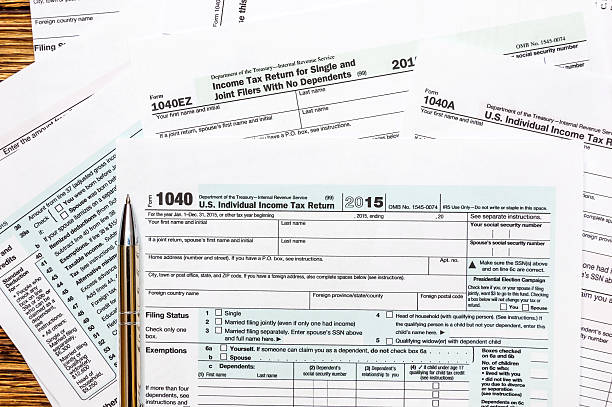 istock Pen on the tax form 615118214