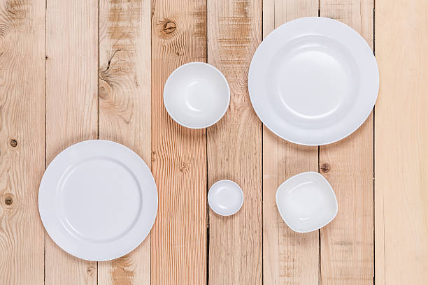 istock Top view empty dish on wooden background. 615233006