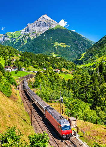Intercity train climbs up the Gotthard railway. The traffic will be diverted to the Gotthard Base Tunnel in December 2016.