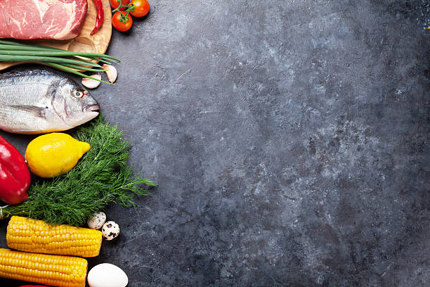 istock Vegetables, fish, meat and ingredients cooking 615241894