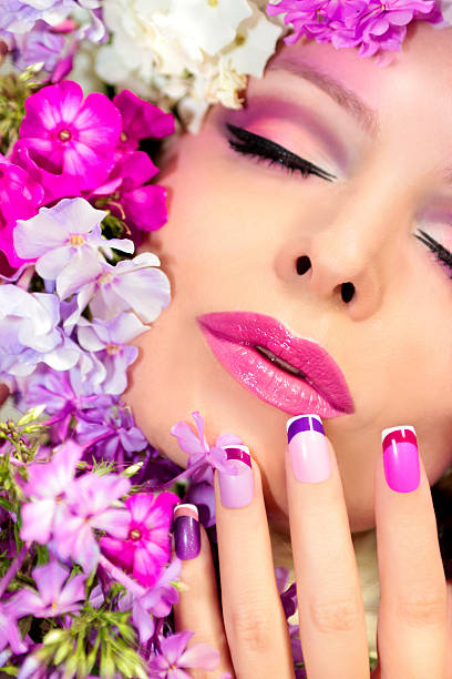 istock Manicure and makeup with phloxes. 615243118