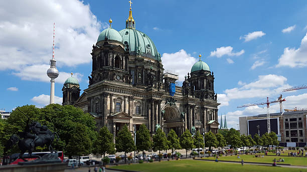 istock Berlin Cathedral and television tower - defocused people 615246216