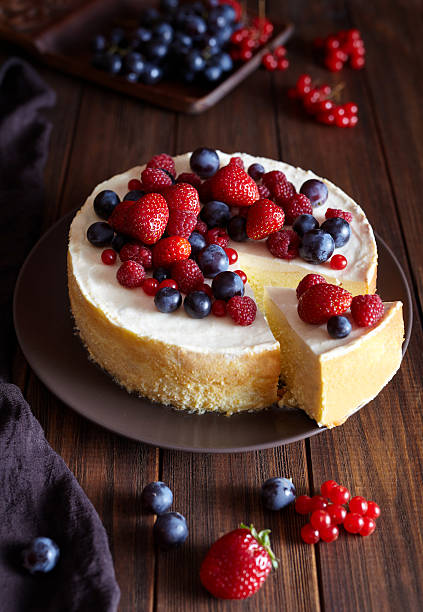 Homemade cheese cake with strawberry and winter berries. New York stock photo