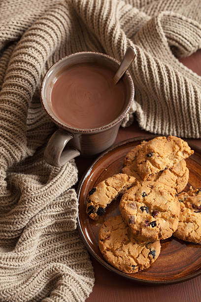 istock hot chocolate warming drink wool throw cozy autumn leaves cookie 615254692
