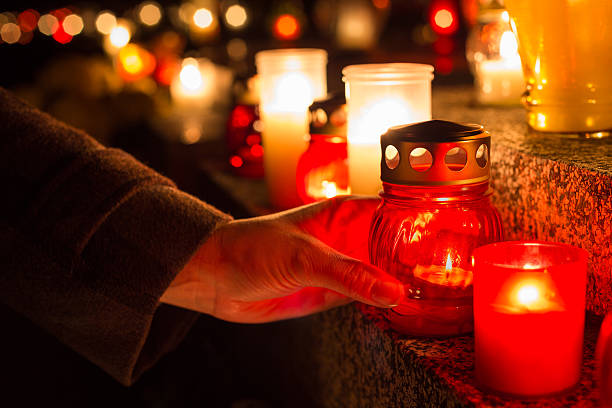 istock Candles Burning At a Cemetery. 615255776