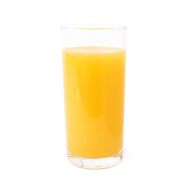 istock Tall glass filled with the orange juice isolated 615261114
