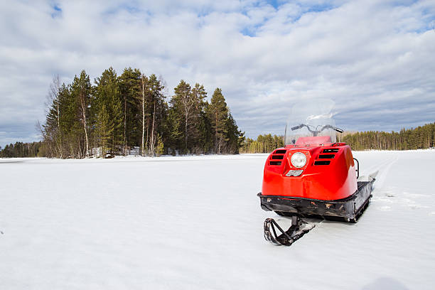 istock snowmobile is on the lake 615263198