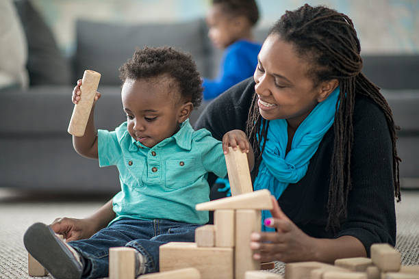 istock Single Mother Watching Her Children 615263628