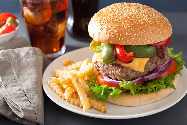 istock homemade cheese burger with peppers tomato onion 615264124