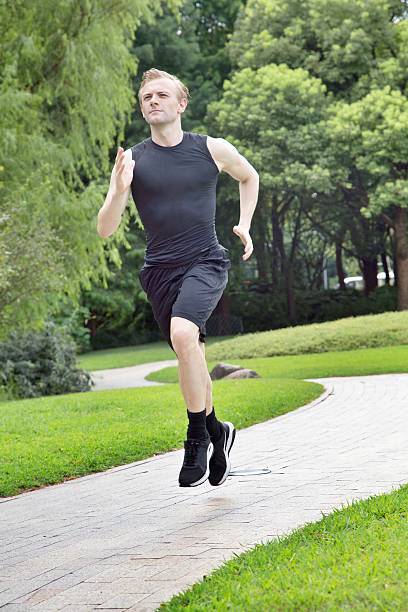istock Caucasian man running in a park 615264636