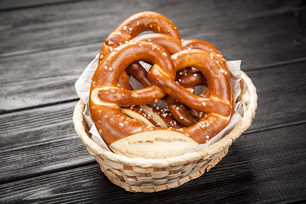istock Pretzels on wooden table 615264862