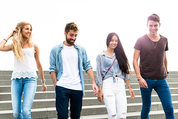 istock Happiness multiracial Friends walking in Barceloneta 615266734