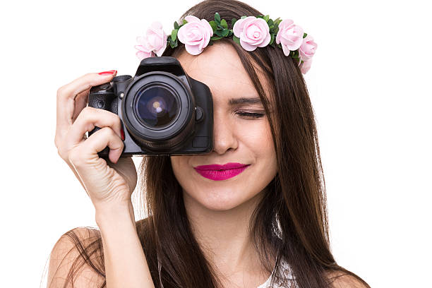 istock Pretty woman taking photos 615267430