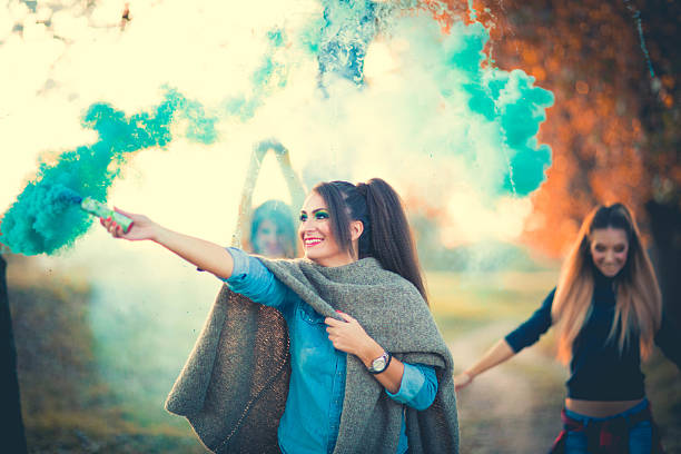istock Girls dancing in the park 615267654