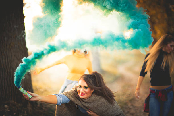 istock Friends dancing in the park 615267674