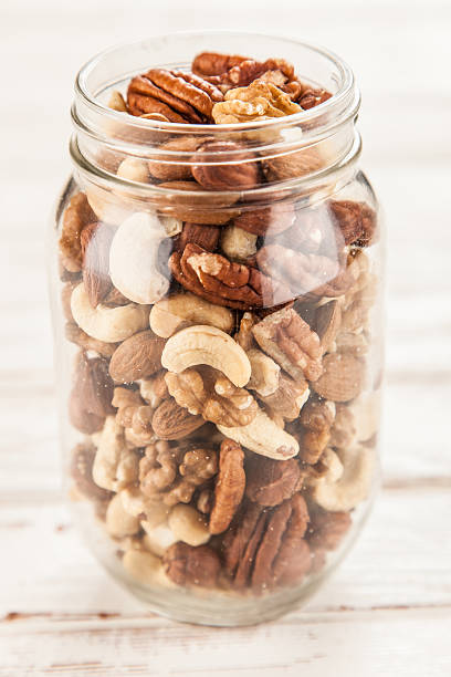 istock Mix of different nuts closeup photo 615268014