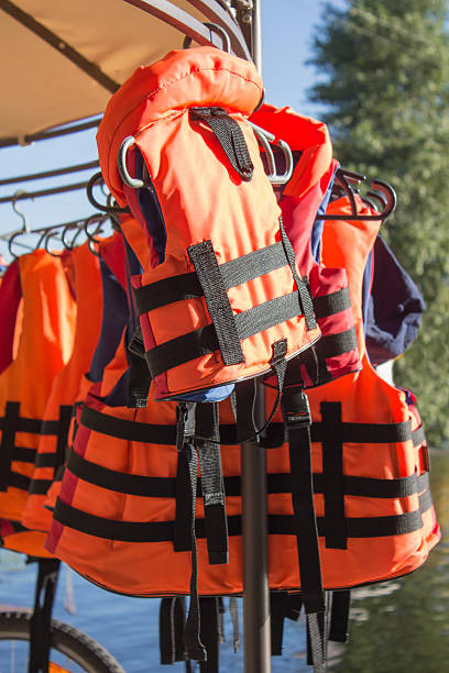 istock safety vests orange save people's lives 615268808
