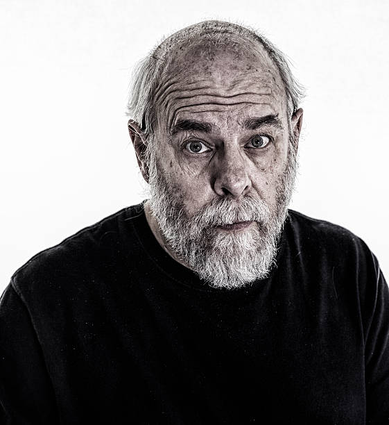 istock Scruffy Senior Man Carlin Quizzical Facial Expression 615268826