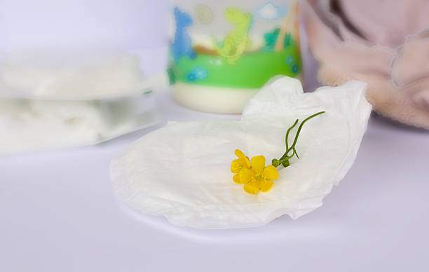 istock Yellow flower on a breast pad.Closeup 615269106