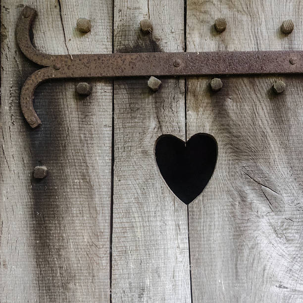 istock Heart carved in wood 615269264