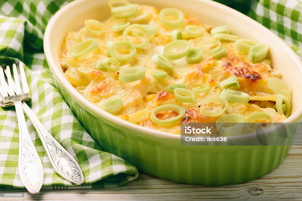 Casserole with chicken, potatoes, leek and cheese. Leek - Vegetable Stock Photo