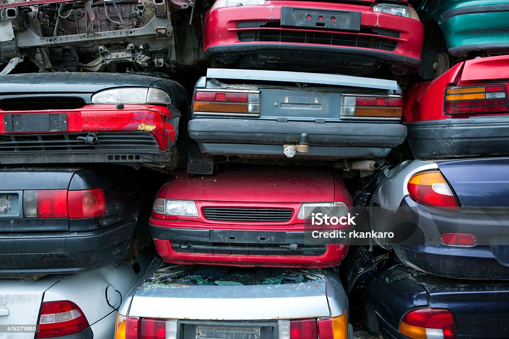 car recycling pile of recycled cars. Junkyard. crushed cars. recycling. Car Stock Photo