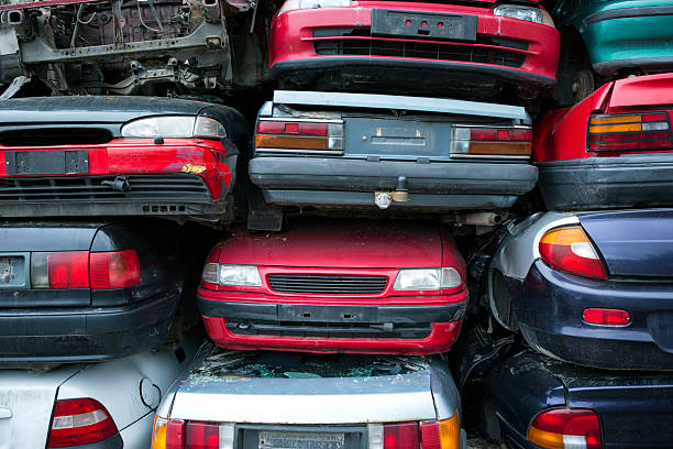 car recycling pile of recycled cars. Junkyard. crushed cars. recycling. disassembling stock pictures, royalty-free photos & images