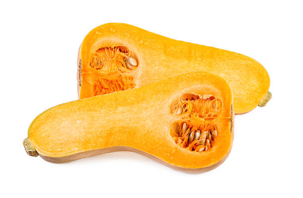 istock Butternut pumpkin. Two halves of butternut squash on white 615272984