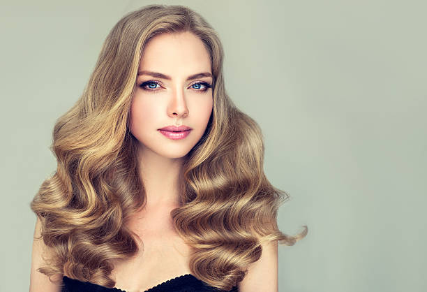 istock Model with blue eyes and wavy hairstyle. 615273228