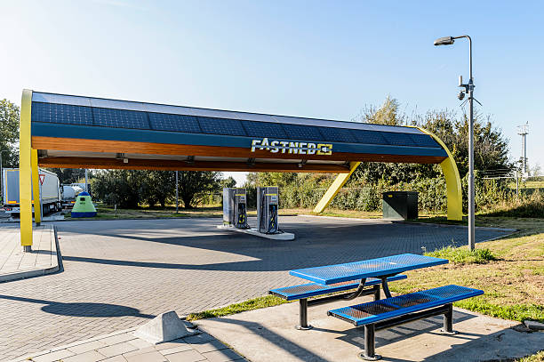 Fast Charging Standards of Fastned for electric cars Dordrecht - The Netherlands - October 16, 2016: Fast Charging Standards of Fastned for electric cars along the A16 at Shell gas station along the A16 Dordrecht dordrecht photos stock pictures, royalty-free photos & images