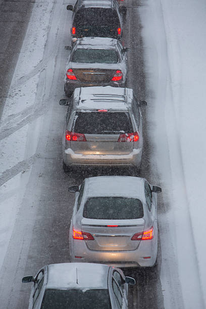 istock Traffic Jam on Snowy Highway 615274158