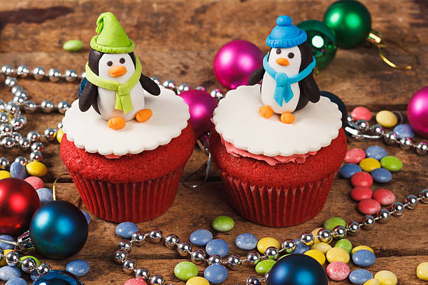 istock Cupcakes with old wooden background 615274340