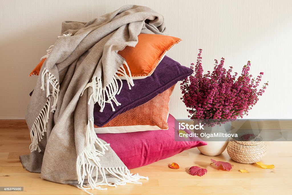 colorful cushions throw cozy home autumn mood flower leaf Blanket Stock Photo