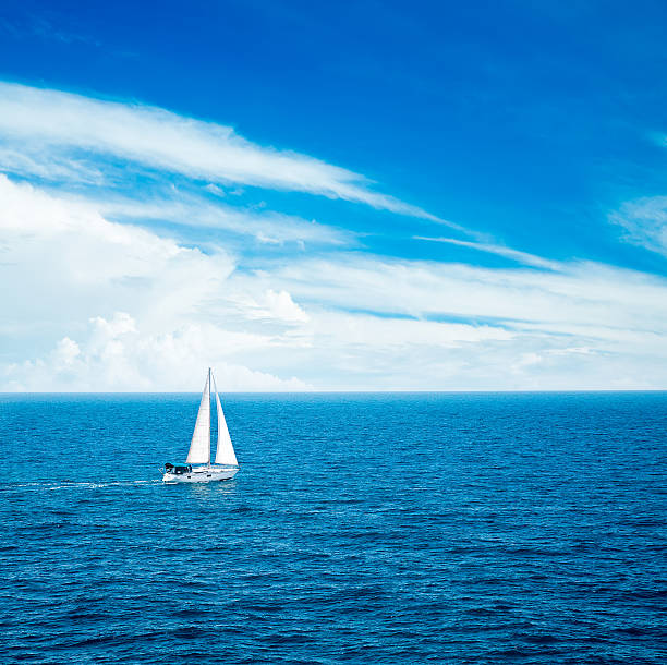 istock White Yacht Sailing in Blue Sea. 615275582