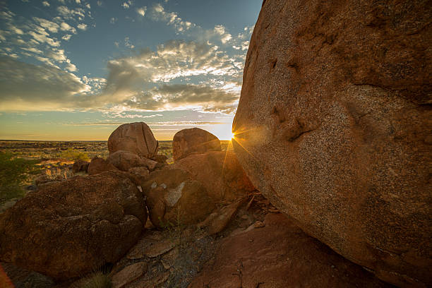 istock Devil's Marbles at sunrise, Northern Territory, Australia 615275726