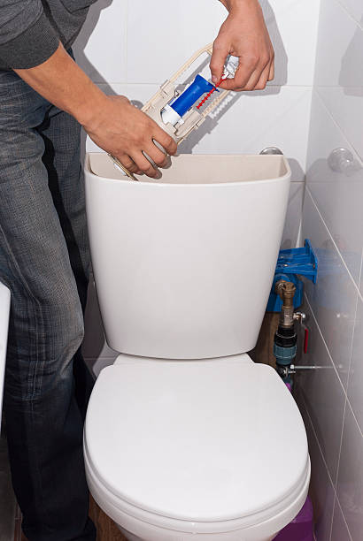 istock repair toilet cistern 615276908