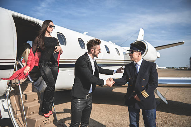 istock Passangers leaving private jet airplane 615278778