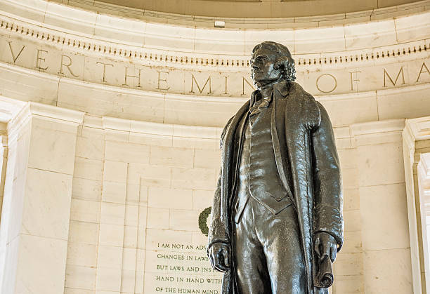 Thomas Jefferson Memorial with bronze statue Washington DC, USA - August 27, 2016: Thomas Jefferson Memorial with bronze statue jefferson memorial interior stock pictures, royalty-free photos & images