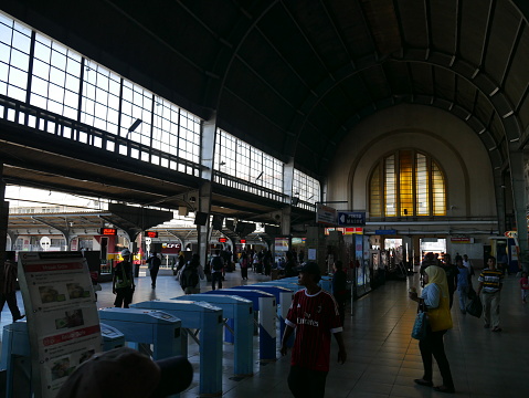 Jakarta, Indonesia - September 29, 2016: Inside of Main railway station, Jakarta Kota Station located in the Old Town area. It is a main railway station in Jakarta. People are around the area.