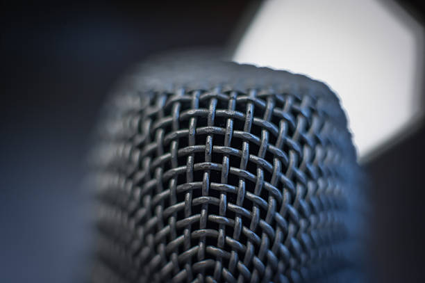 istock Microphone macro close up detail blue atmosphere 615281806